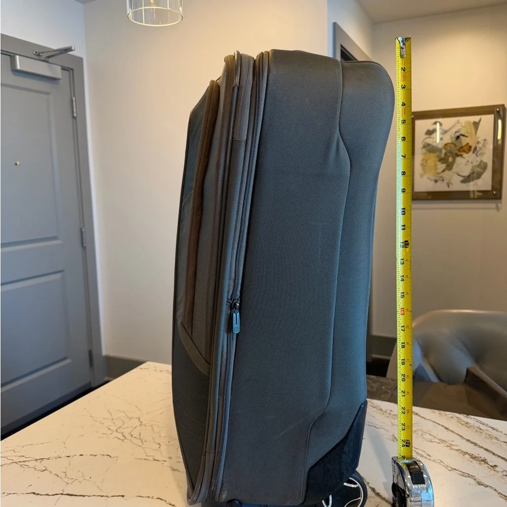 Tumi Brown Backpack with Multiple Compartments